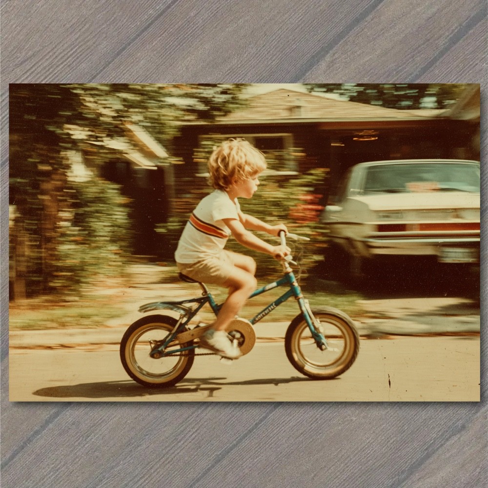 STICKER Kid Riding Small Bicycle 1970s Suburban Motion Blur Summer Snapshot