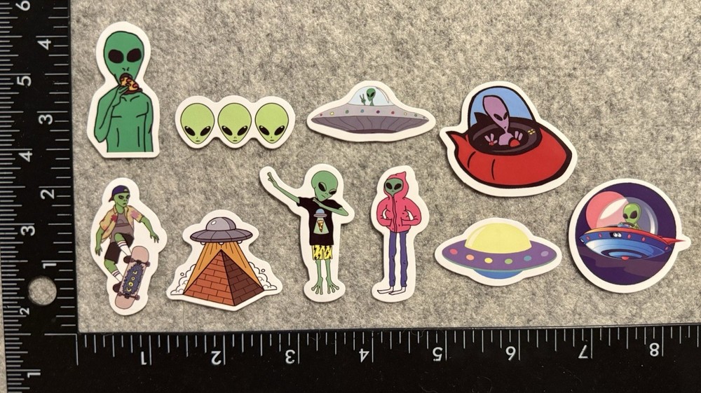 Lot of 10 Assorted Alien Extraterrestrial Space Stickers