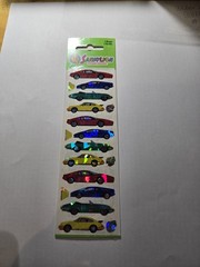 Vintage SandyLion Prismatic Race Cars Stickers Sealed Red, Green, Blue Yellow