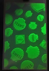 VTG Polaroid 3-D 90’s Hologram Sticker- SHELL Transparent 2 x 3.25″