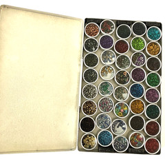 #1 – METAL CASE w/ 40 METAL CONTAINERS of SCRAPBOOKING EMBELLISHMENTS – EYELETS