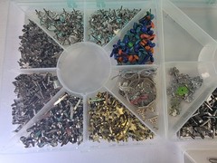 Scrapbooking Assorted Lot of 5 level case Metal Brads , Hearts, Stars Flowers