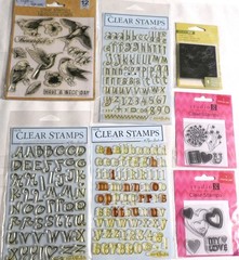 BRAND NEW-SEALED-STAMPS ! MIXED LOT OF 11 . A CRAFT THAT I NEVER EVEN STARTED!