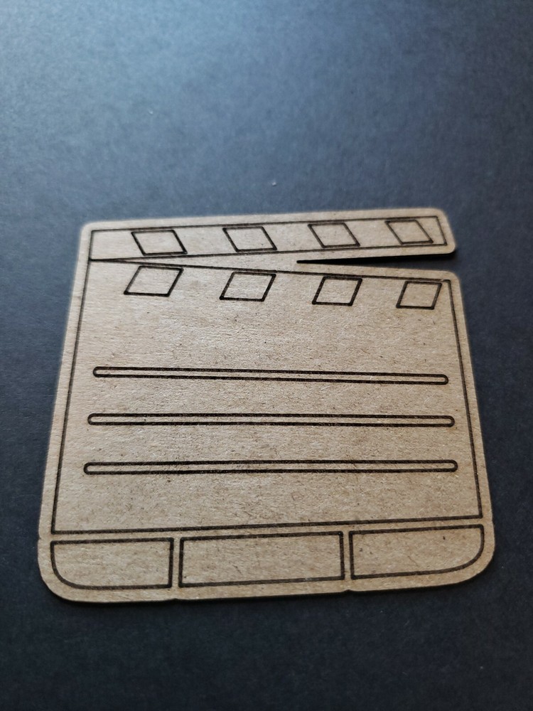 Chipboard Scrapbooking laser scored and cut die cut embellishment movie clap boa