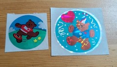 Vintage 1986 Sandylion large 3” circle prism sticker of Birthday bear & Frisbee