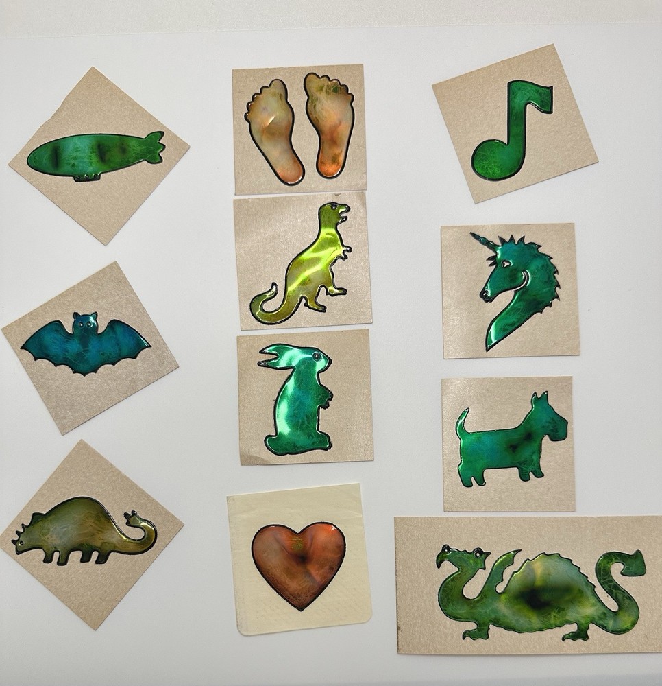 1980’s ollie stickers one owner, backings and oil still intact. Lot of 16.