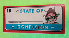 vintage 80’s Scholastic State of Confusion name tag sticker *damaged*