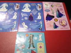 (3) Disney Frozen stickers and (1) Half-Cut