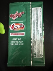 Raising Cane’s A Christmas Story Sticker Scene Pack + Green Doggie Finger Puppet